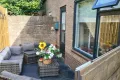 De tuin met tuin set